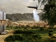2 TB1.png (955 KB) Thunderbird 1 arriving at the Saharan plant