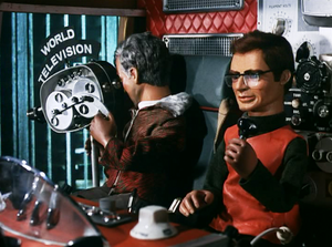 Cameraman (left) and Eddie Kerr