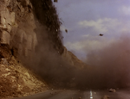 When the Hood escapes from the tunnel, Virgil fires missiles at the cliff to make a landslide to block the Hood's route