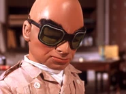 The Hood sets to work cutting a doorway