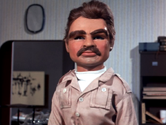 CW416.png (659 KB) Combed back hair and a drooping moustache, wearing a beige worksuit
