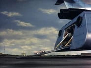 Cars enter the cargo bay