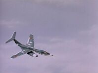 A UN10 Fighter Jet moving in to destroy the "dummy" plane.