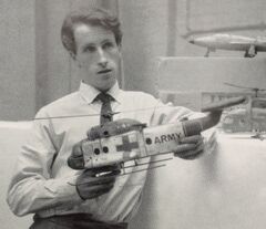 Mike Trim holding the air ambulance helicopter from Pit of Peril. Also in the picture is Copter Watchdog, as well as the Skyhawk jet.