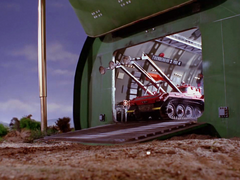 The DOMO exiting Thunderbird 2's pod