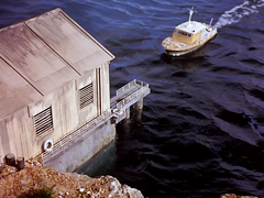 Carl's Launch enters the boathouse