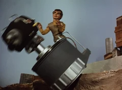 Joe and his camera disappear down the hole too