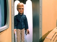 Alan climbing out of the lift