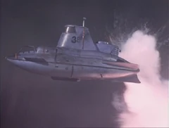 Thunderbird 4's torpedo hits the submarine