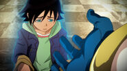 A young Kotetsu glowing with his BLUE glow, and the hand of Mr. Legend reaching out to him.