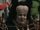 Man with Big Forehead in Red Queen's Court