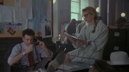 Vicki and Knox working at Gotham Globe the next day.