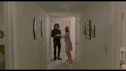 Peg giving Edward some new clothes.
