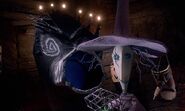 Shock about to throw a caged bug down a chute, delivering it to Oogie Boogie.