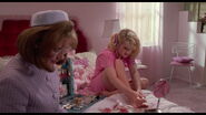 Peg trying to make a sale with the girl.