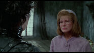 Peg sad when Edward tells her his father "never woke up."