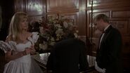 Vicki at Bruce Wayne's charity ball.
