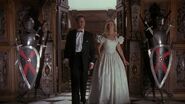 Vicki and Knox finding themselves in a room full of armory.