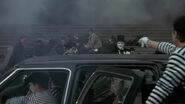The Joker and his goons escaping after successfully killing Vinnie Ricorso.