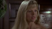 Vicki asking a man where she can find Bruce Wayne.