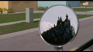 The Inventor's house in Peg Boggs's rearview mirror.