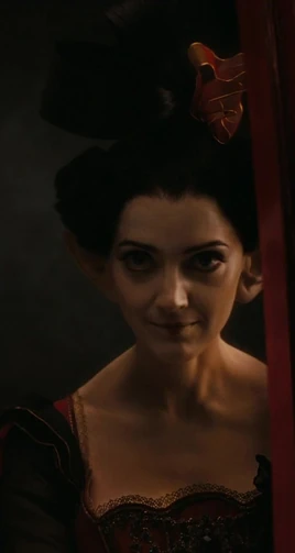 Woman with Big Ears in Red Queen's Court