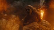 The White Queen managing to escape the Jabberwocky's attack, losing her crown in the process.