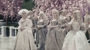 The White Queen with her courtiers.