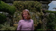 Peg amazed by the topiaries.