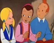 The siblings with Tintin.