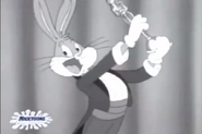 Bugs accepting his Shloskar award in Who Bopped Bugs Bunny?