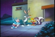 Shirley wearing a pink blouse and a red skirt while she is laughing with Bugs, Buster, Fifi and a pig that resembles Hamton