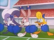 Babs as the head cheerleader with Shirley and Fifi