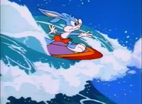 Buster surfing the massive tidal wave from the dam Babs opened