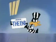 Daffy holding up a THE END license plate at the end of "Who Bopped Bugs Bunny?"