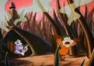 Flea in orange sweater goof