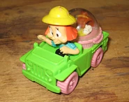 Elmyra Duff in a jeep with a scurrying rabbit