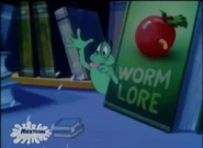 Bookworm escapes from Sweetie in his favorite book, Worm Lore