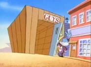 Buster builds an outhouse that says GUYS...