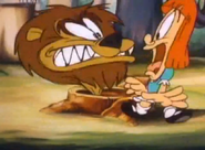 Buster uses a lion to scare Elmyra