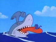 Ma Shark catches Furrball on her tongue