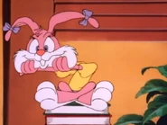 Babs removing her head while imitating Shirley