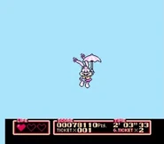 Babs floats down on a parasol