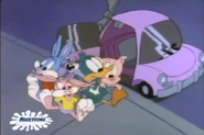 The Tiny Toons arrive in a wind-up car