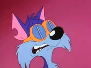 Furrball wears goggles to protect his eyes from Sylvester's spit