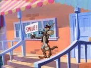 The Coyote Kid takes a picture of his gang with Buster's camera...