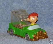 Montana Max in a green car with bouncing coins
