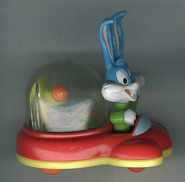 Buster Bunny in a red car with a basketball hoop