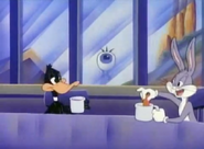 Daffy with Bugs in the teacher's lounge in "Wild Takes Class"