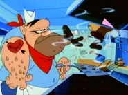 The cafeteria worker flipping sausage patties